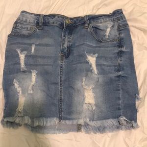 A light blue denim skirt